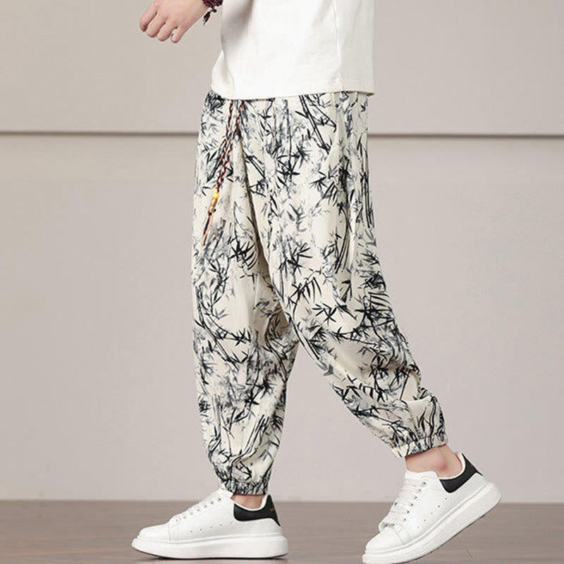 Pantalones harén con cordón y bolsillos para hombre con estampado de hojas de bambú y Buddha Stones