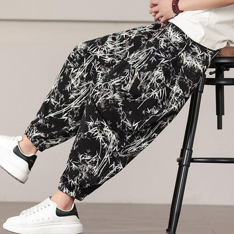 Pantalones harén con cordón y bolsillos para hombre con estampado de hojas de bambú y Buddha Stones