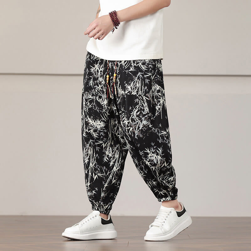 Pantalones harén con cordón y bolsillos para hombre con estampado de hojas de bambú y Buddha Stones