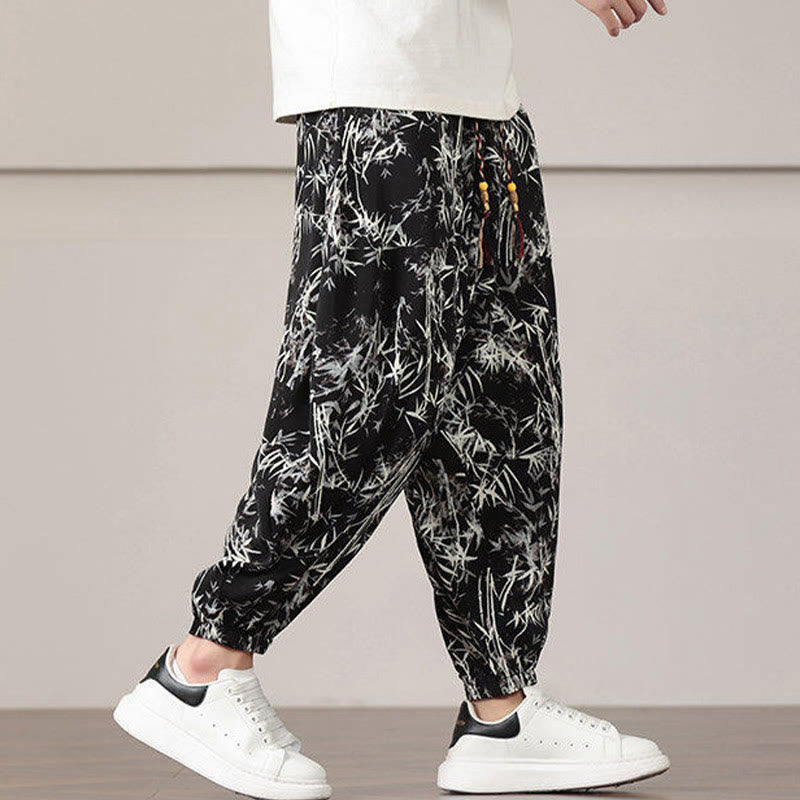Pantalones harén con cordón y bolsillos para hombre con estampado de hojas de bambú y Buddha Stones