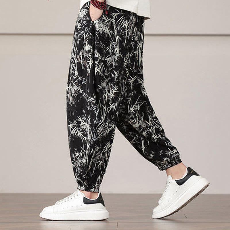 Pantalones harén con cordón y bolsillos para hombre con estampado de hojas de bambú y Buddha Stones