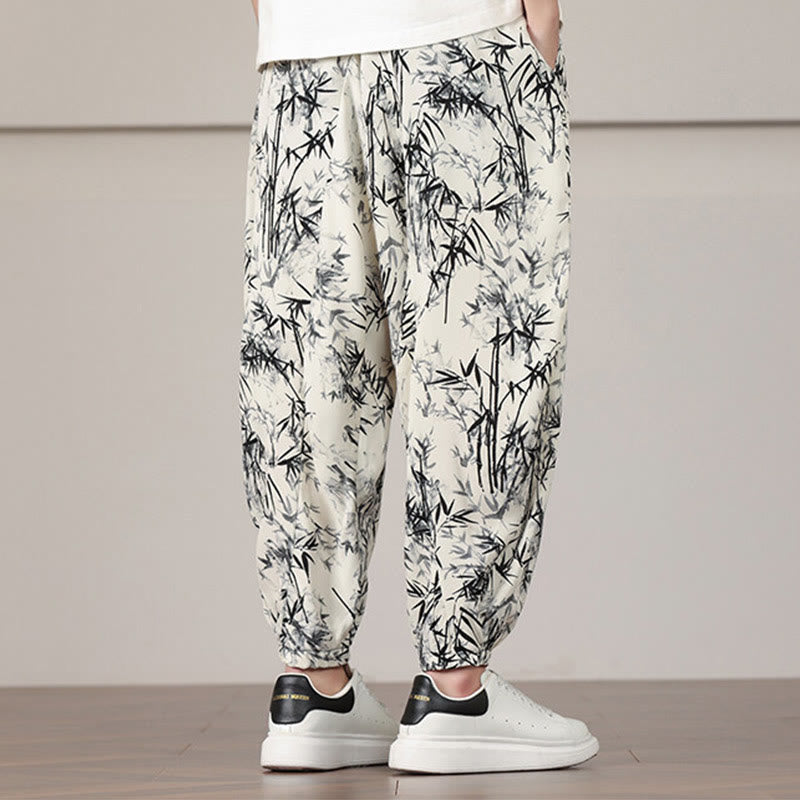 Pantalones harén con cordón y bolsillos para hombre con estampado de hojas de bambú y Buddha Stones