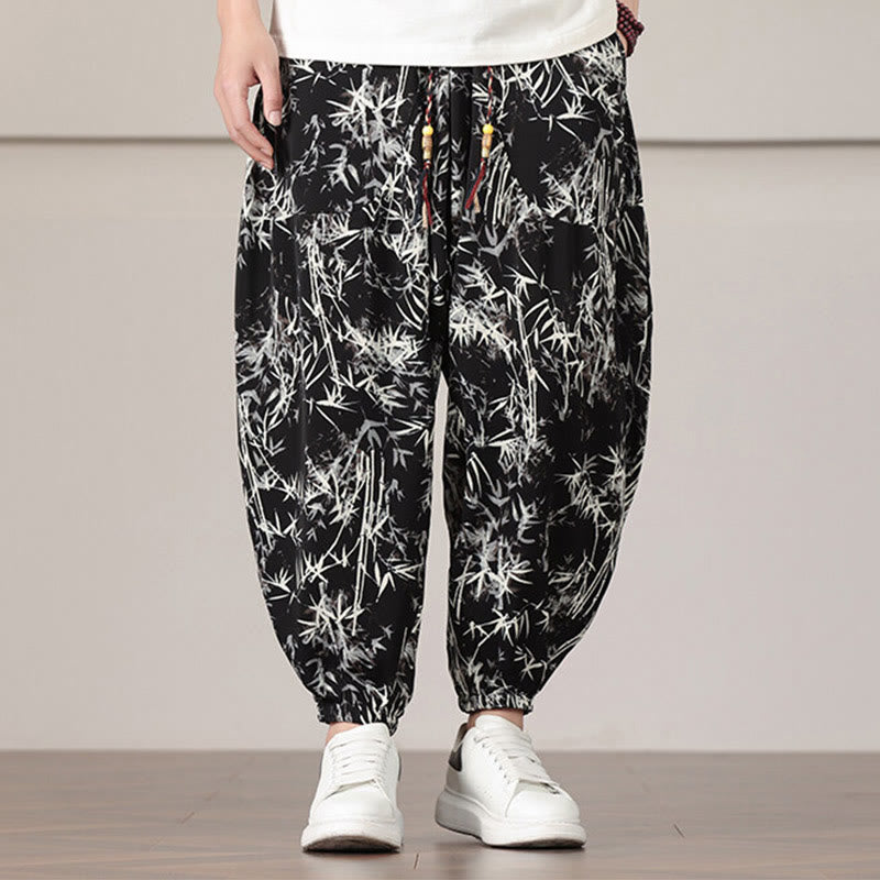 Pantalones harén con cordón y bolsillos para hombre con estampado de hojas de bambú y Buddha Stones