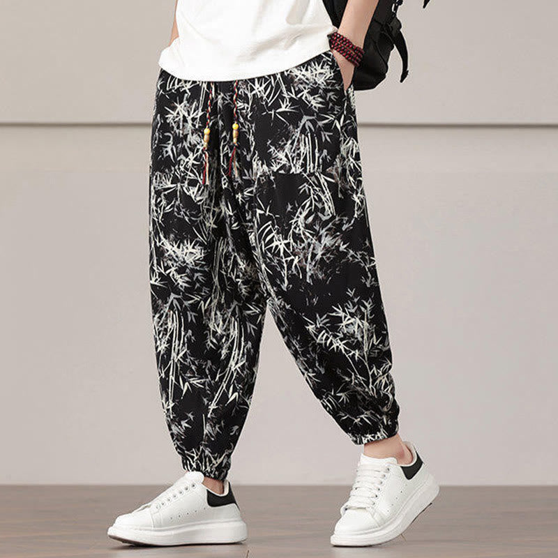 Pantalones harén con cordón y bolsillos para hombre con estampado de hojas de bambú y Buddha Stones