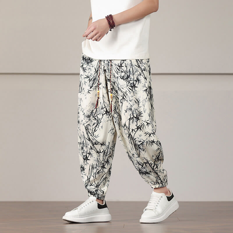 Pantalones harén con cordón y bolsillos para hombre con estampado de hojas de bambú y Buddha Stones