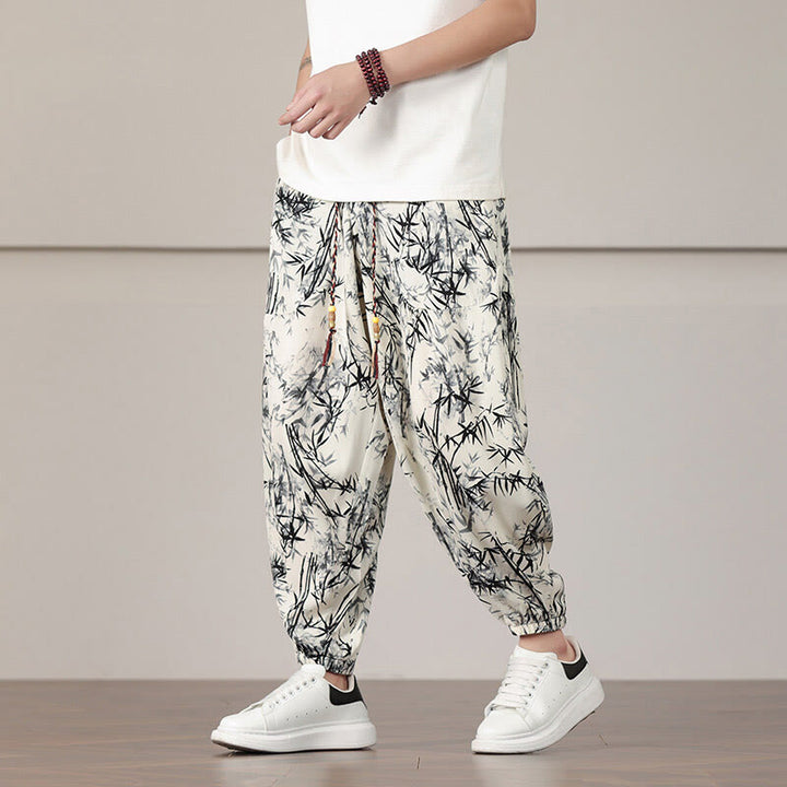 Pantalones harén con cordón y bolsillos para hombre con estampado de hojas de bambú y Buddha Stones