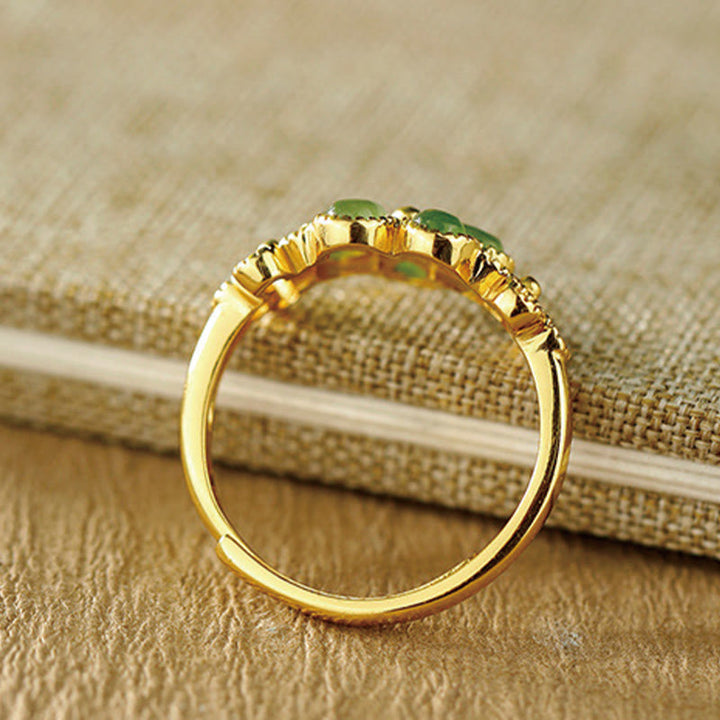 Anillo de prosperidad ajustable con flor de oro bañado en plata de ley 925 y jade hetiano natural de Buddha Stones