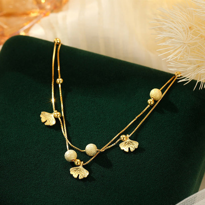 Tobillera con protección de doble capa y hojas de ginkgo en plata de ley 925 con Buddha Stones