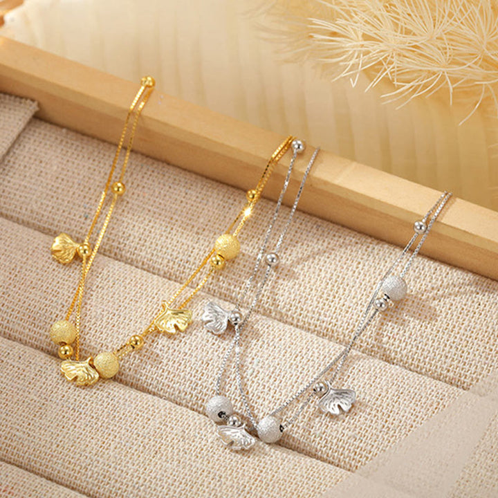 Tobillera con protección de doble capa y hojas de ginkgo en plata de ley 925 con Buddha Stones