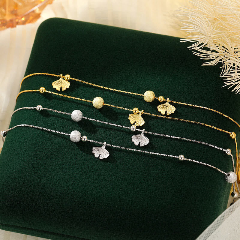 Tobillera con protección de doble capa y hojas de ginkgo en plata de ley 925 con Buddha Stones