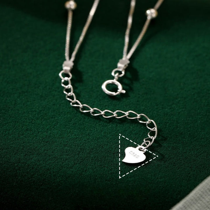 Tobillera con protección de doble capa y hojas de ginkgo en plata de ley 925 con Buddha Stones