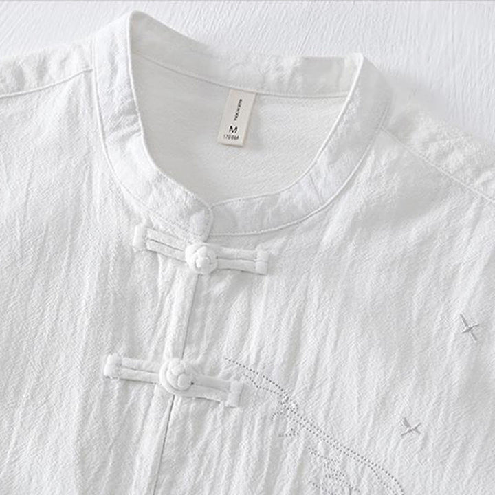Camisa de hombre de manga corta de algodón y lino con bordado de Buddha Stones y botones de rana, cuello mandarín