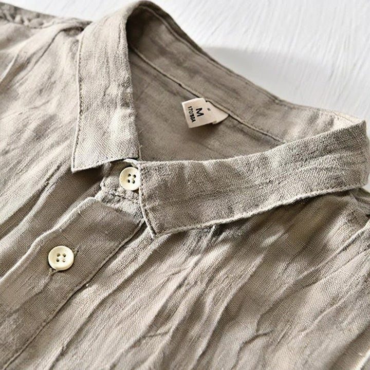 Camisa de lino con solapa de manga corta y medio botón para hombre con diseño simple de Buddha Stones - image 1
