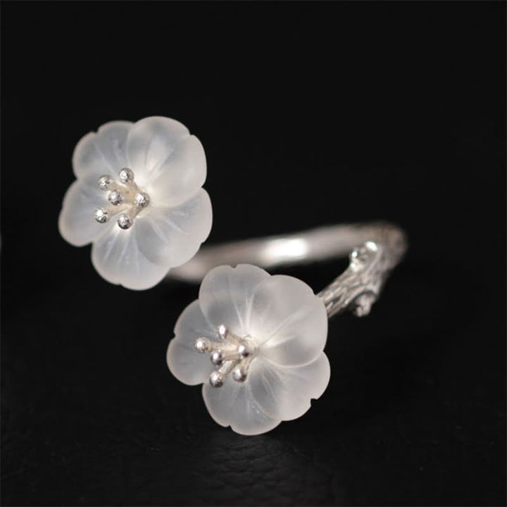 Anillo de protección ajustable con doble flor de ciruelo y cristales blancos de plata de ley 925 de Buddha Stones