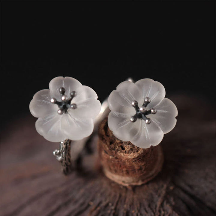 Anillo de protección ajustable con doble flor de ciruelo y cristales blancos de plata de ley 925 de Buddha Stones