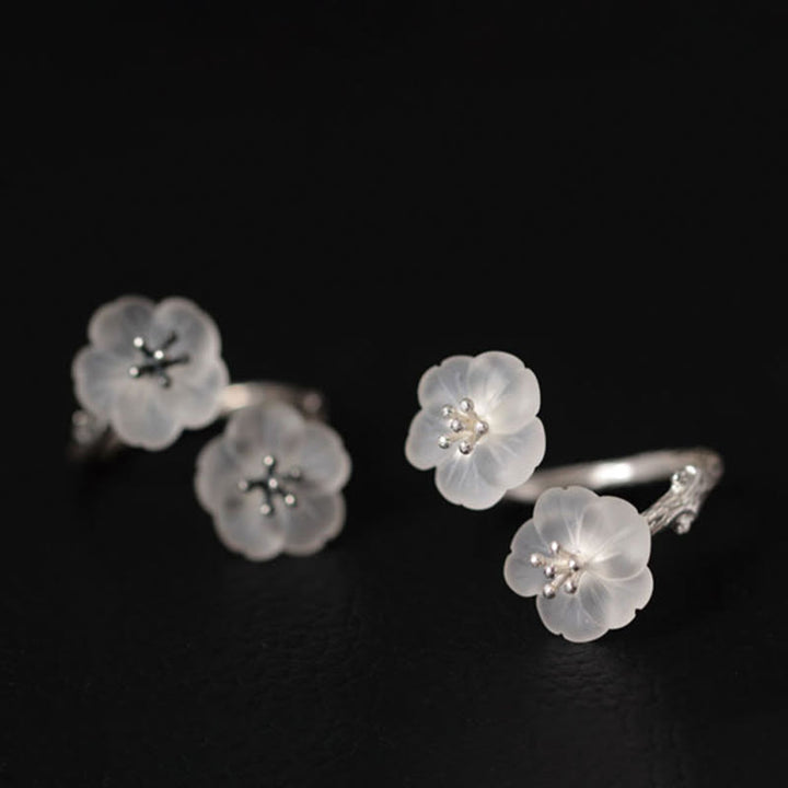 Anillo de protección ajustable con doble flor de ciruelo y cristales blancos de plata de ley 925 de Buddha Stones