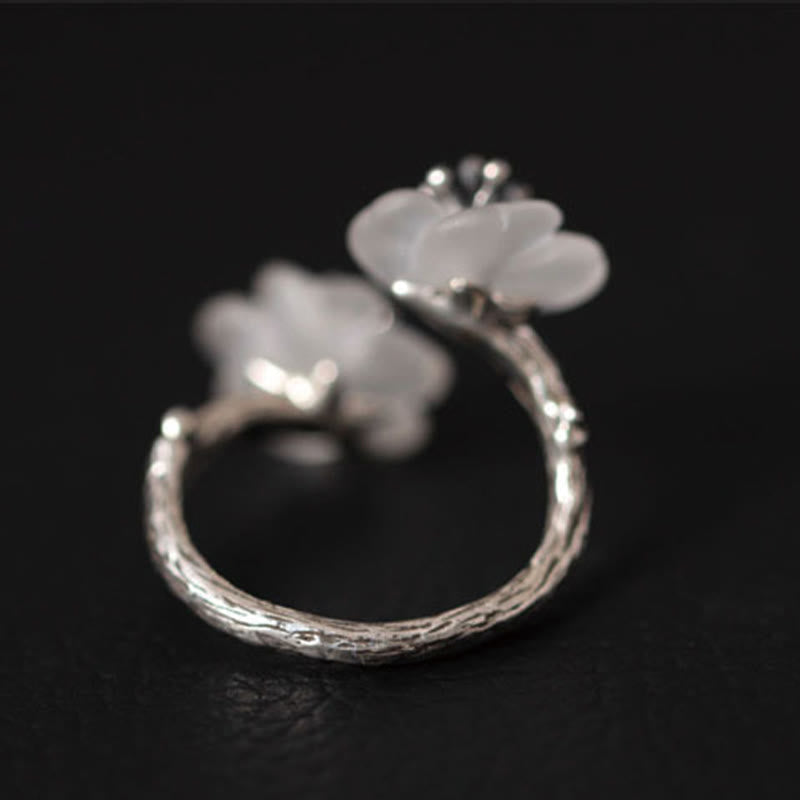 Anillo de protección ajustable con doble flor de ciruelo y cristales blancos de plata de ley 925 de Buddha Stones
