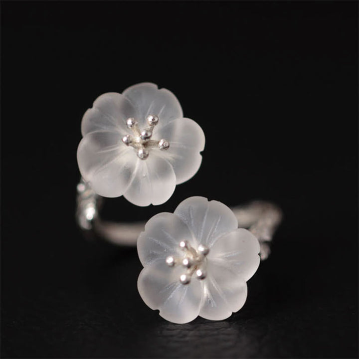 Anillo de protección ajustable con doble flor de ciruelo y cristales blancos de plata de ley 925 de Buddha Stones