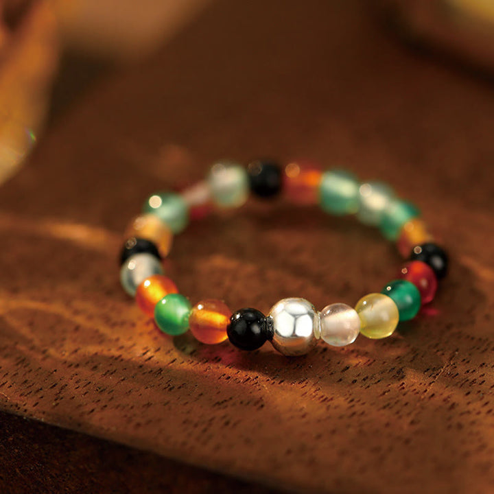 Anillo elástico con bendición de Buddha Stones, cuentas de cristal de plata de ley 925 y jade blanco y ónix negro.