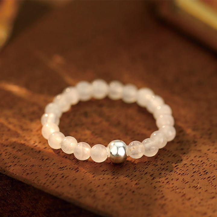 Anillo elástico con bendición de Buddha Stones, cuentas de cristal de plata de ley 925 y jade blanco y ónix negro.