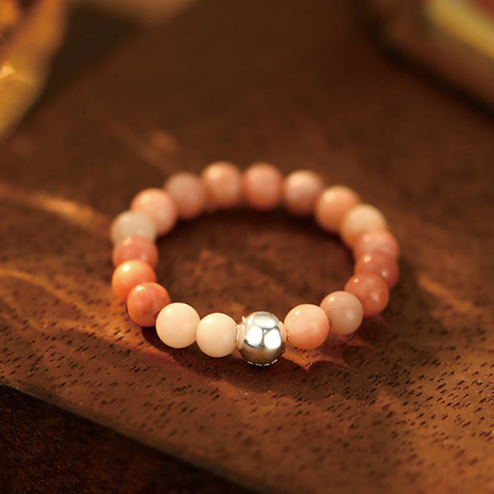 Anillo elástico con bendición de Buddha Stones, cuentas de cristal de plata de ley 925 y jade blanco y ónix negro.