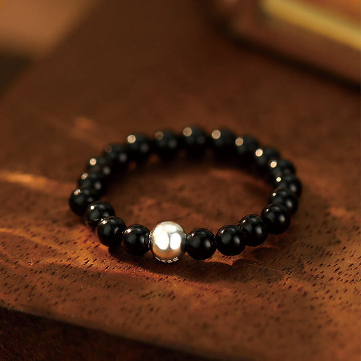 Anillo elástico con bendición de Buddha Stones, cuentas de cristal de plata de ley 925 y jade blanco y ónix negro.