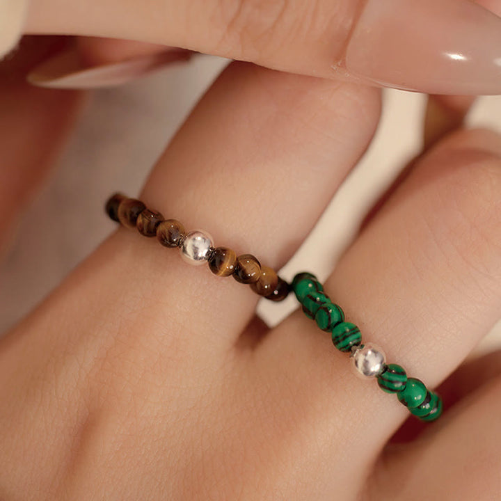 Anillo elástico con bendición de Buddha Stones, cuentas de cristal de plata de ley 925 y jade blanco y ónix negro.