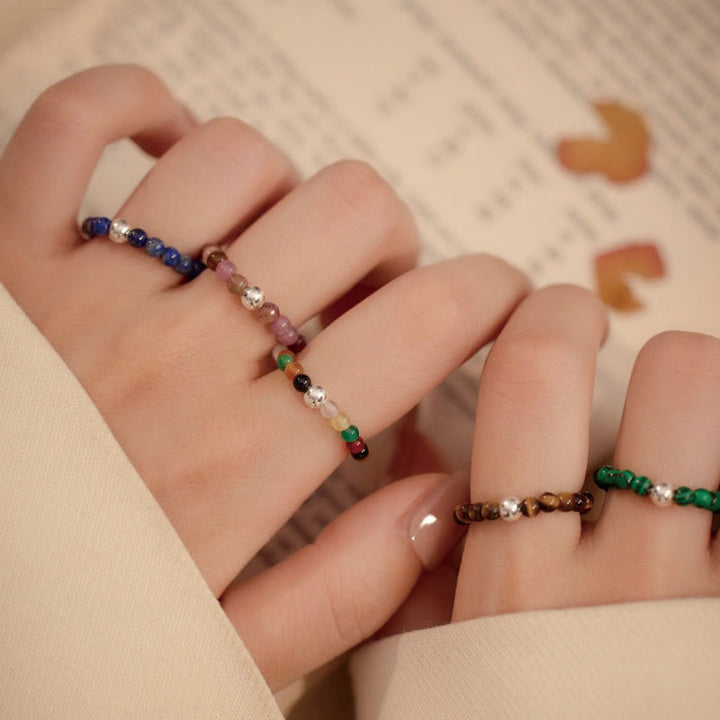 Anillo elástico con bendición de Buddha Stones, cuentas de cristal de plata de ley 925 y jade blanco y ónix negro.