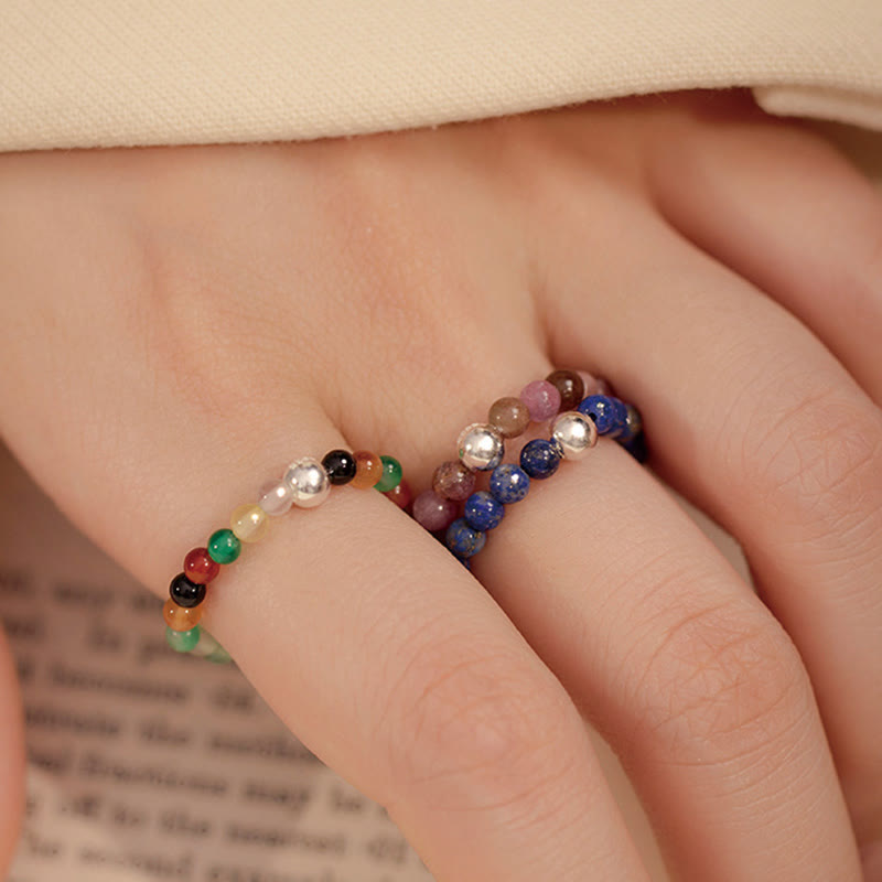 Anillo elástico con bendición de Buddha Stones, cuentas de cristal de plata de ley 925 y jade blanco y ónix negro.