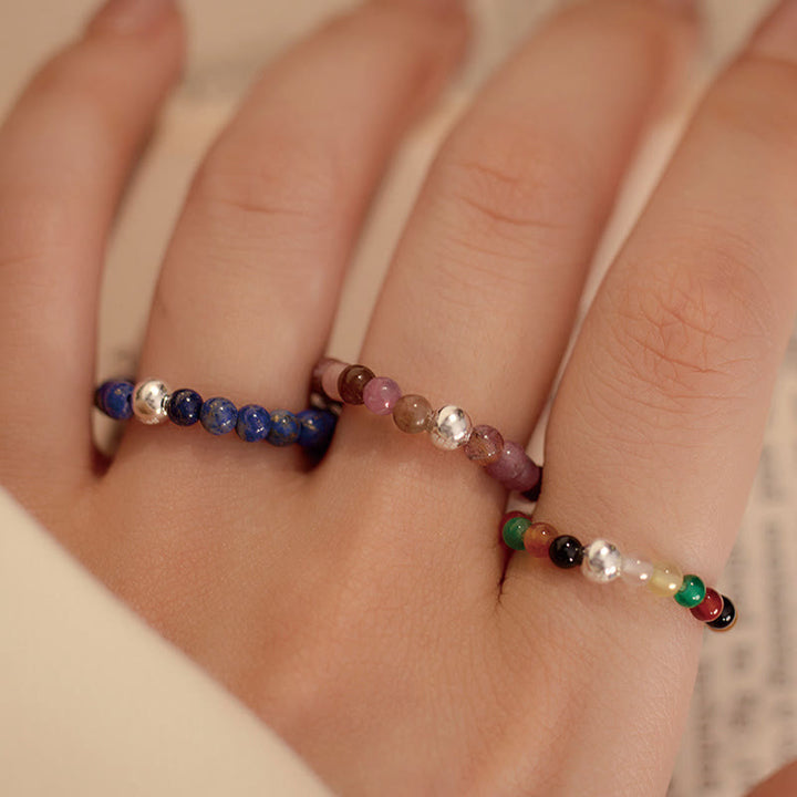 Anillo elástico con bendición de Buddha Stones, cuentas de cristal de plata de ley 925 y jade blanco y ónix negro.
