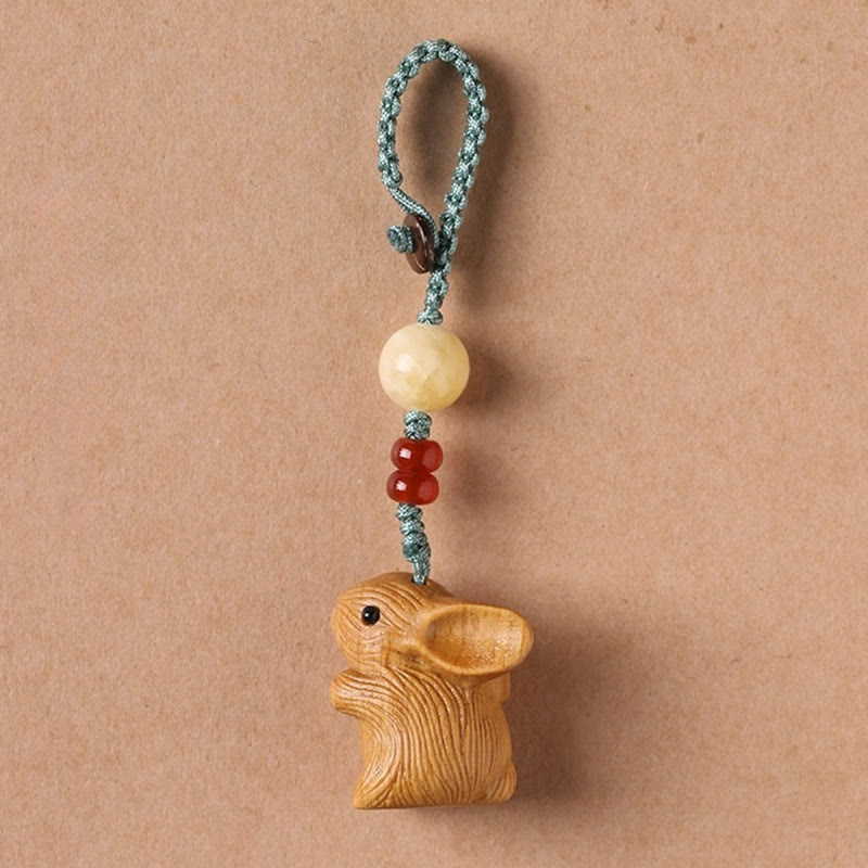 Llavero con colgante para teléfono, diseño de conejo de la suerte, con forma de sándalo rojo, con forma de hoja pequeña y piedras de Buddha Stones.