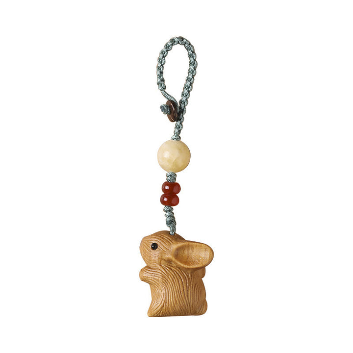 Llavero con colgante para teléfono, diseño de conejo de la suerte, con forma de sándalo rojo, con forma de hoja pequeña y piedras de Buddha Stones.