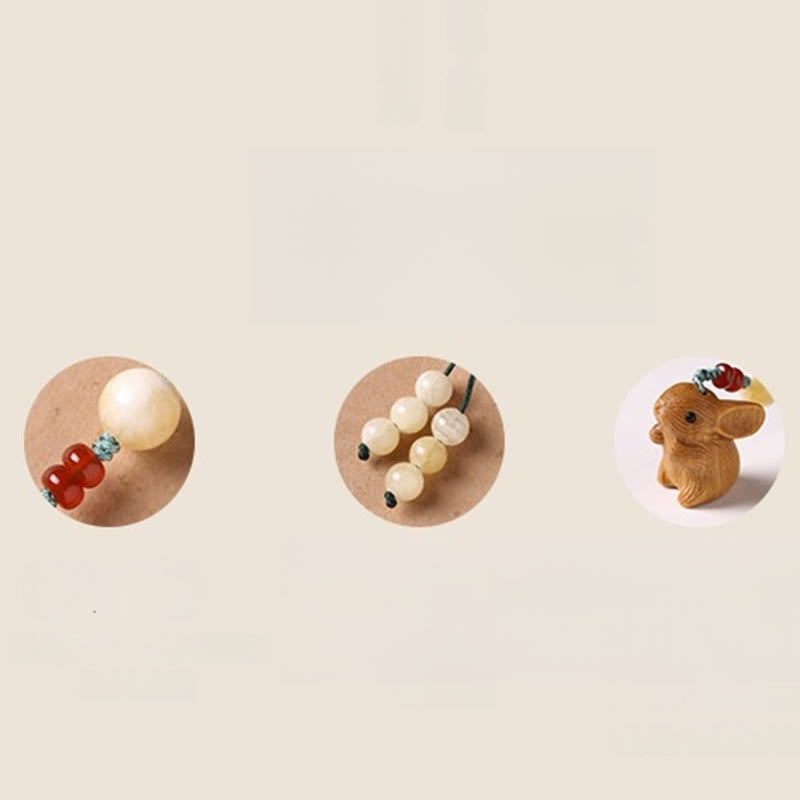 Llavero con colgante para teléfono, diseño de conejo de la suerte, con forma de sándalo rojo, con forma de hoja pequeña y piedras de Buddha Stones.