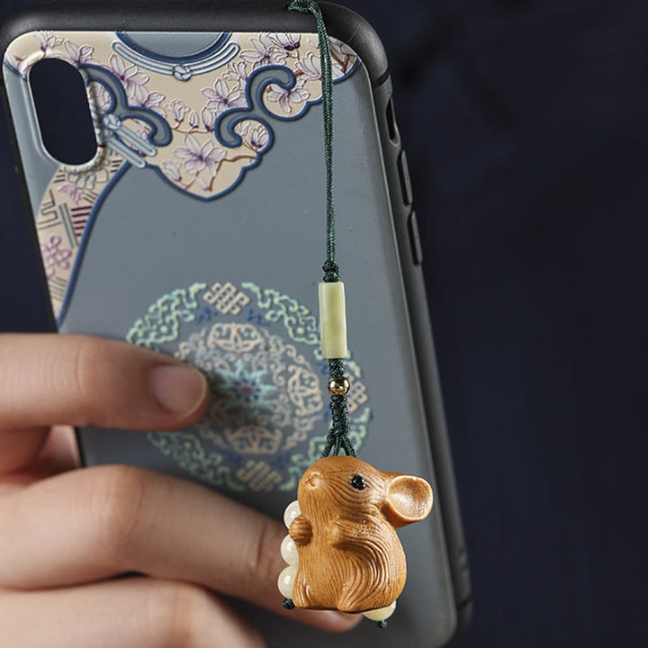 Llavero con colgante para teléfono, diseño de conejo de la suerte, con forma de sándalo rojo, con forma de hoja pequeña y piedras de Buddha Stones.