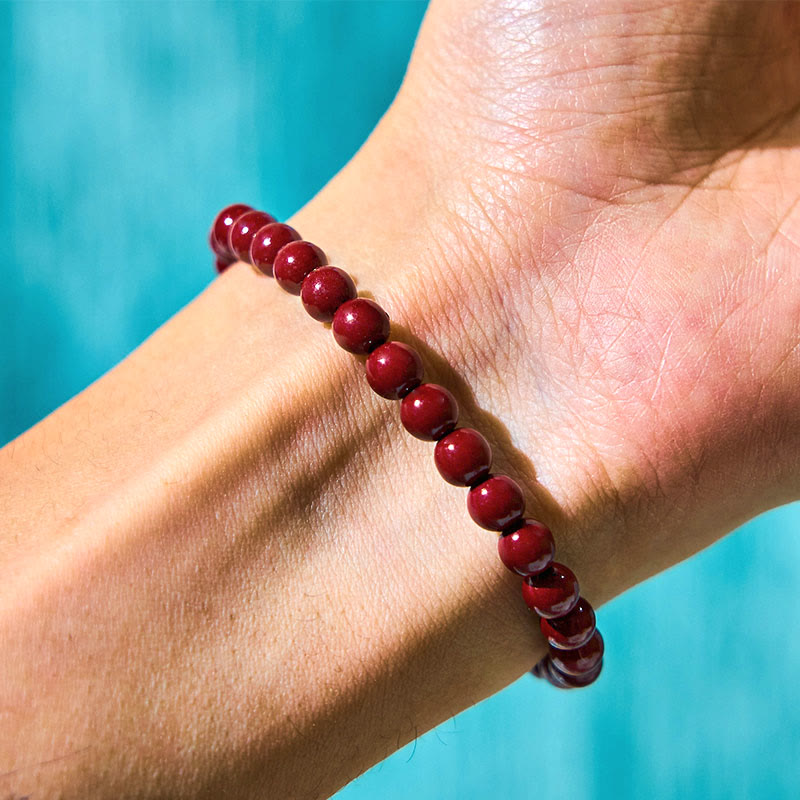 Pulsera de concentración de bambú y cinabrio con Buddha Stones