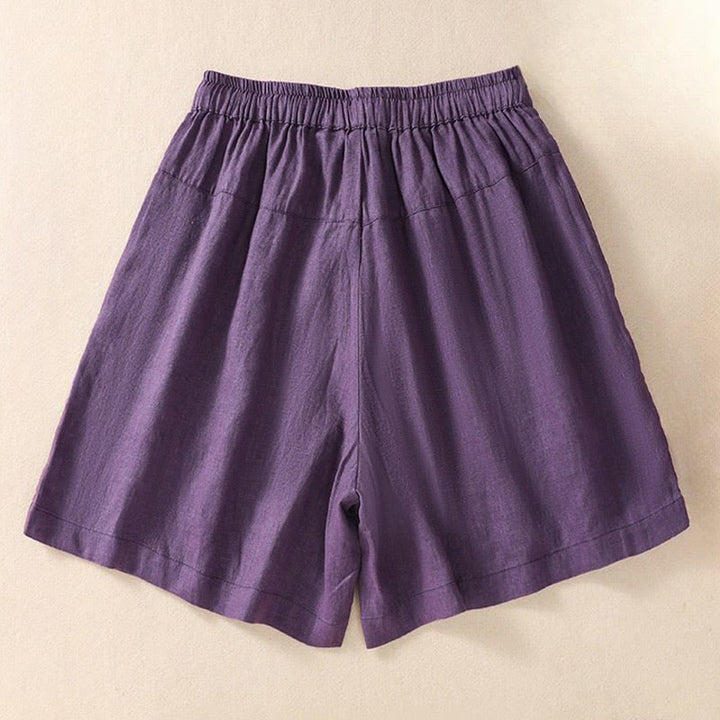 Pantalones cortos de mujer con cordón ajustable, bolsillos y estampado floral informal de Buddha Stones. - image 1