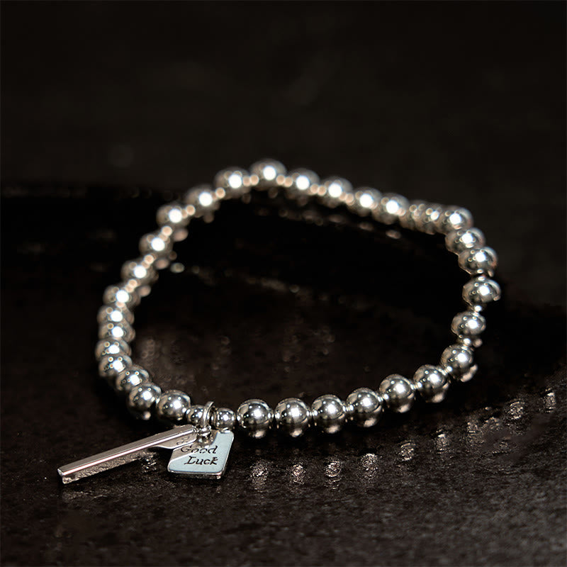 Pulsera de equilibrio de buena suerte de acero y titanio con Buddha Stones