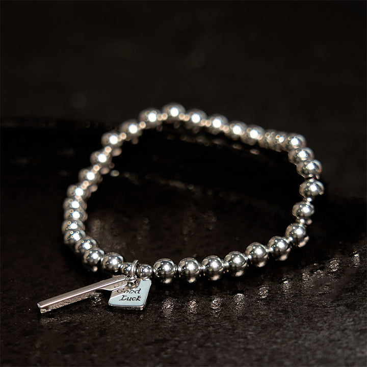 Pulsera de equilibrio de buena suerte de acero y titanio con Buddha Stones