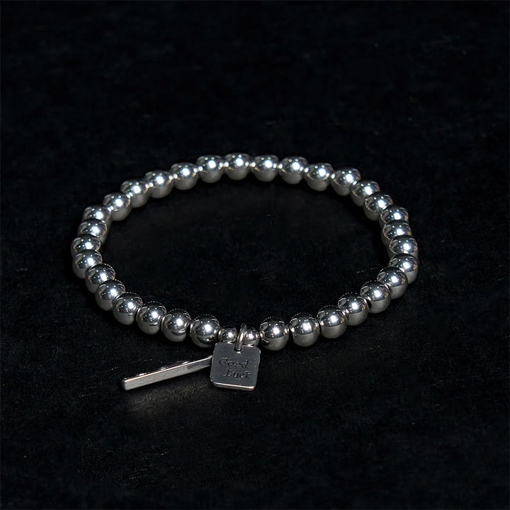 Pulsera de equilibrio de buena suerte de acero y titanio con Buddha Stones