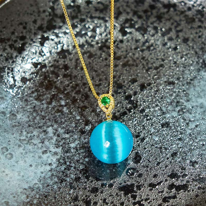 Buddha Stones Colgante de collar con forma de bola redonda de ojo de gato que inspira confianza - image 3
