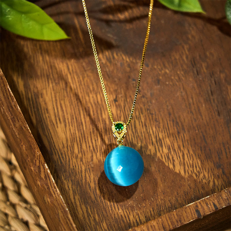 Buddha Stones Colgante de collar con forma de bola redonda de ojo de gato que inspira confianza - image 1