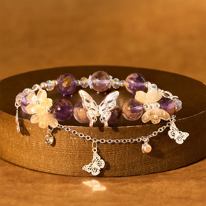 Pulsera de sabiduría con flores de mariposa fantasma moradas naturales y Buddha Stones