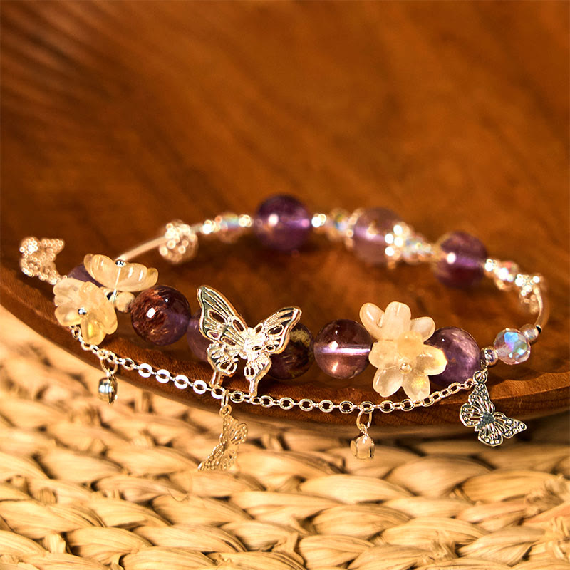 Pulsera de sabiduría con flores de mariposa fantasma moradas naturales y Buddha Stones