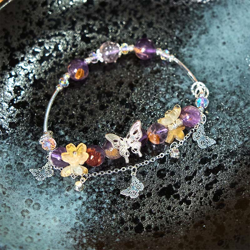 Pulsera de sabiduría con flores de mariposa fantasma moradas naturales y Buddha Stones