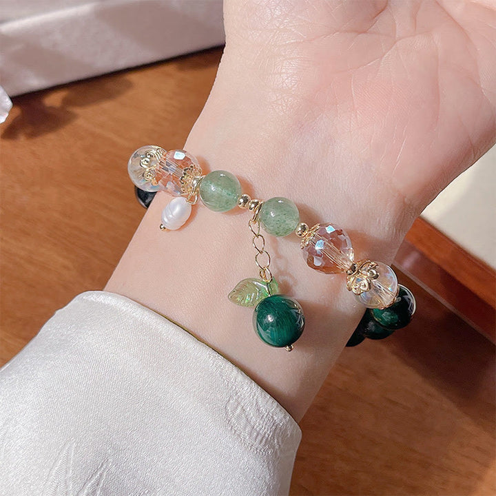 Pulsera positiva con cuentas de ojo de tigre verde natural de Buddha Stones y hoja verde