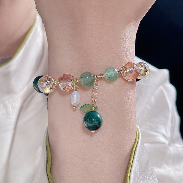 Pulsera positiva con cuentas de ojo de tigre verde natural de Buddha Stones y hoja verde