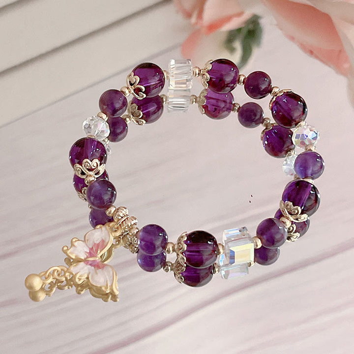 Pulsera de la paz con mariposa y piedra solar de amatista natural de Buddha Stones