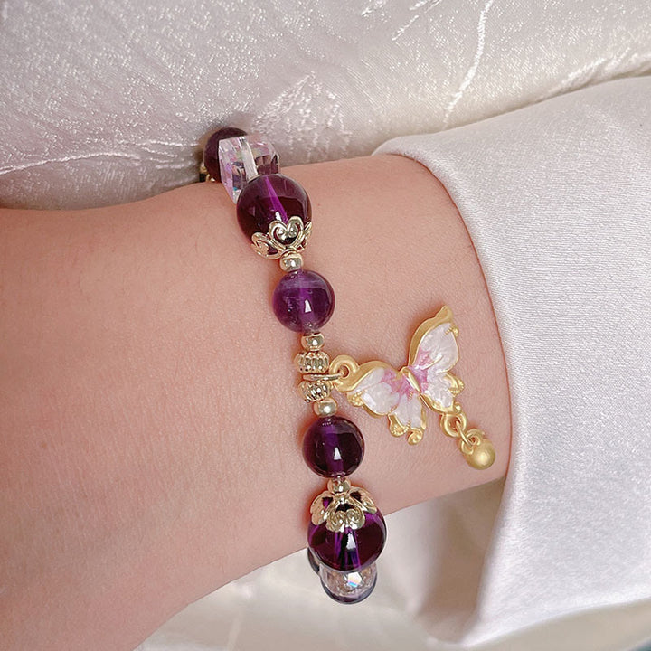Pulsera de la paz con mariposa y piedra solar de amatista natural de Buddha Stones