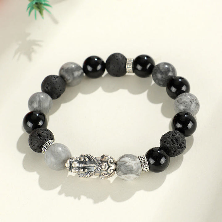 Pulsera de protección de piedra de lava con ónix negro y jaspe gris de Buddha Stones en plata de ley 999.