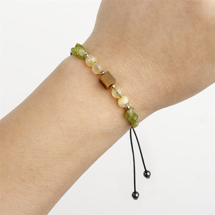 Pulsera de cuerda de la paz con Buddha Stones " Encuentra tu alegría", peridoto, citrino y ojo de tigre